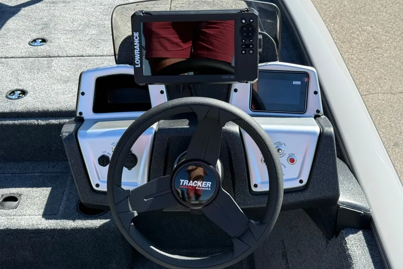 Slide: The Image of Steering console of 2027 Tracker Pro Team 195 boat with Lowrance display. - 13