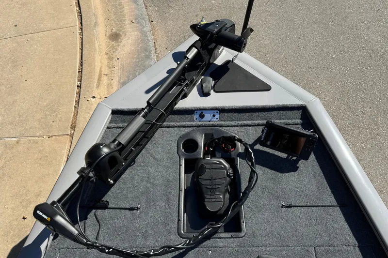 Slide: The Image of 2027 Tracker Pro Team 195 boat deck with trolling motor and fish finder. - 14
