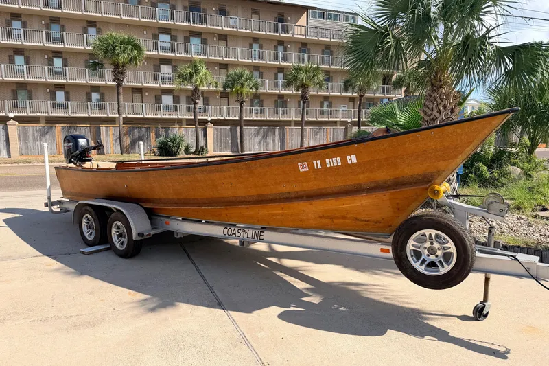The Image of Homemade 2015 Jetdrive Skiff on trailer, parked near palm trees and building. - 0