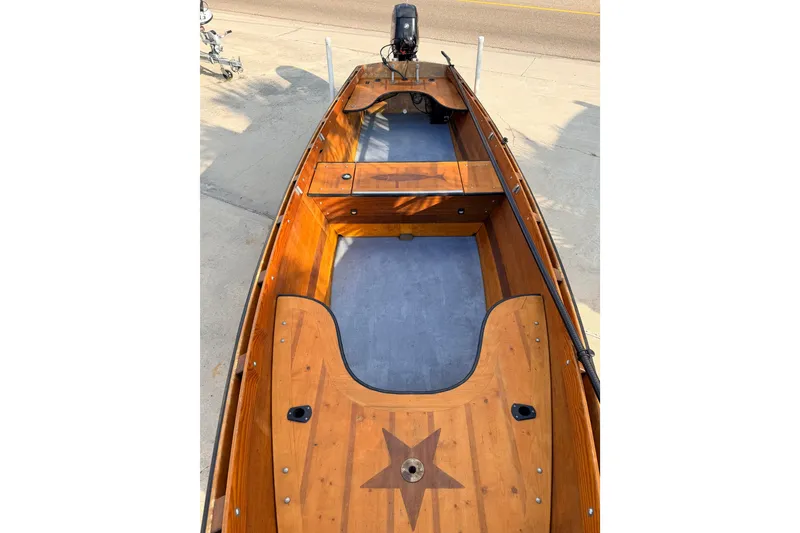 Slide: The Image of Wooden Homemade Jetdrive Skiff boat, 2015 model, with star design on deck. - 6