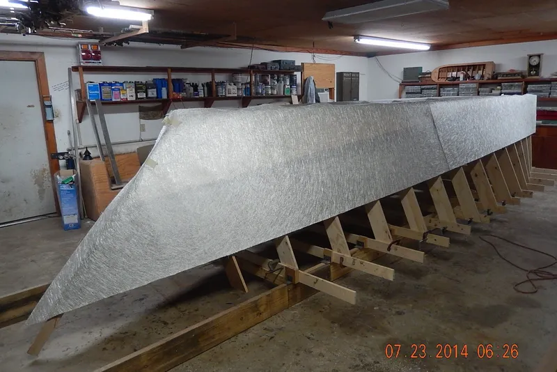 Slide: The Image of Homemade Jetdrive Skiff under construction in a workshop, 2015 model. - 25
