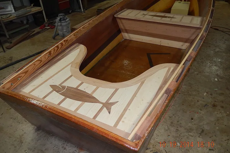 Slide: The Image of Homemade Jetdrive Skiff 2015 with wooden fish inlay design on deck. - 31