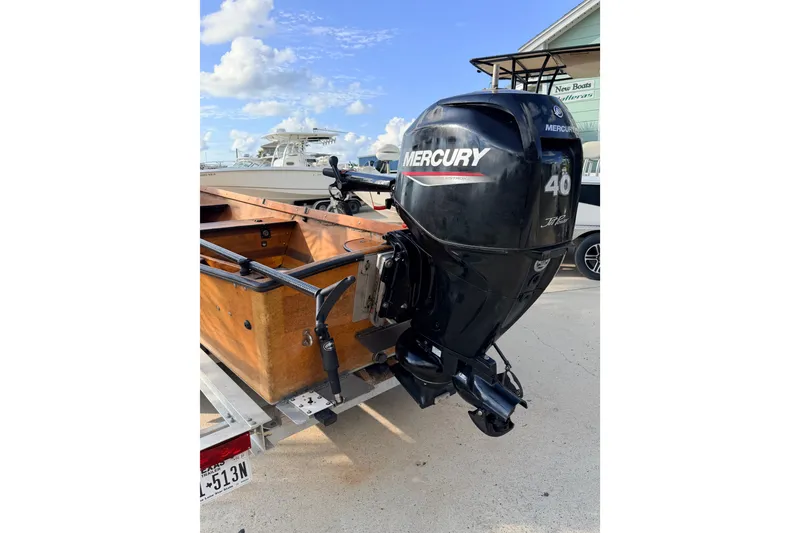 Slide: The Image of Homemade 2015 Jetdrive Skiff with Mercury 40 outboard motor on trailer. - 18