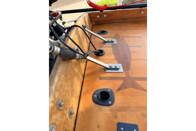 Slide: The Image of Wooden deck of a 2015 Homemade Jetdrive Skiff with fish design and metal fittings. - 17