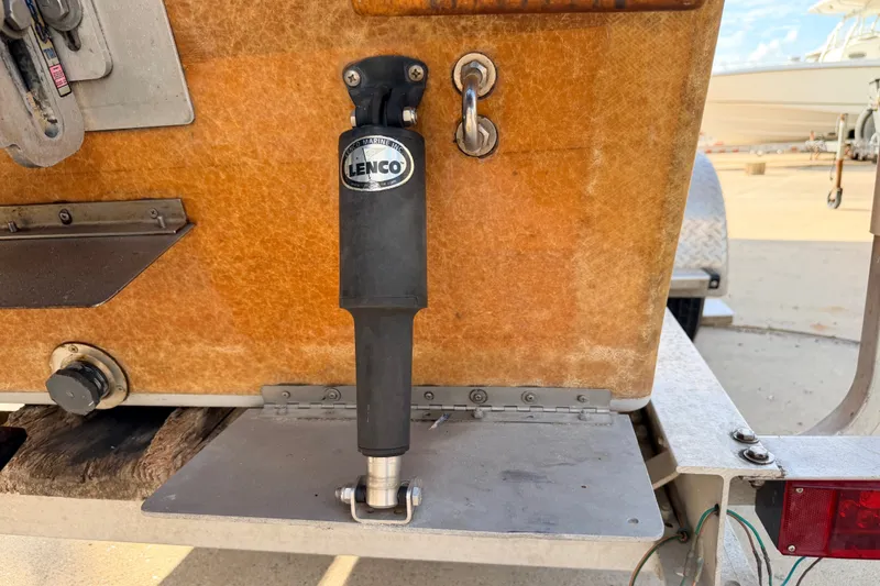 Slide: The Image of Rear view of a 2015 Homemade Jetdrive Skiff with Lenco trim tab actuator. - 21