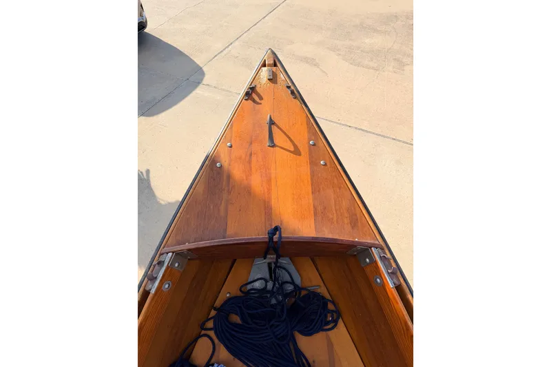 Slide: The Image of Wooden deck of a 2015 Homemade Jetdrive Skiff with coiled rope. - 14