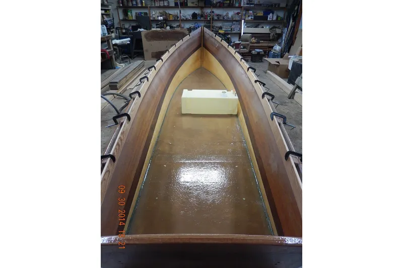 Slide: The Image of Homemade 2015 Jetdrive Skiff under construction in a workshop setting. - 28