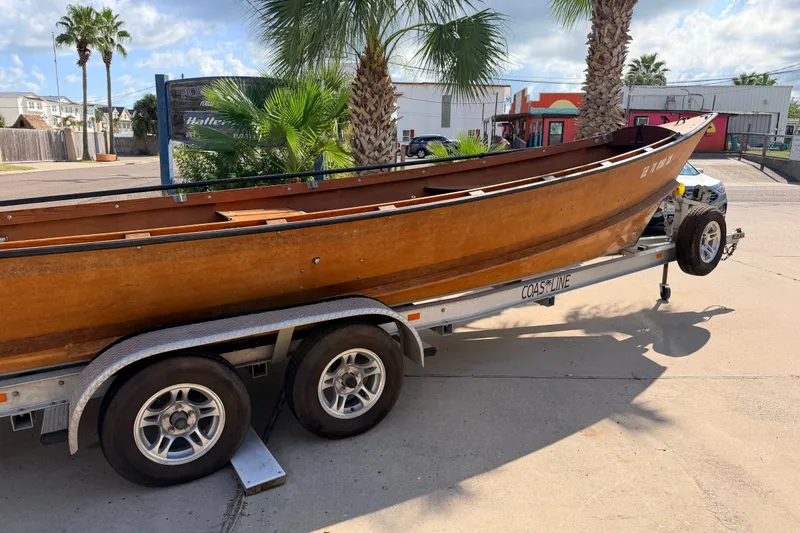 Slide: The Image of Homemade 2015 Jetdrive Skiff on trailer, parked outdoors near palm trees. - 23