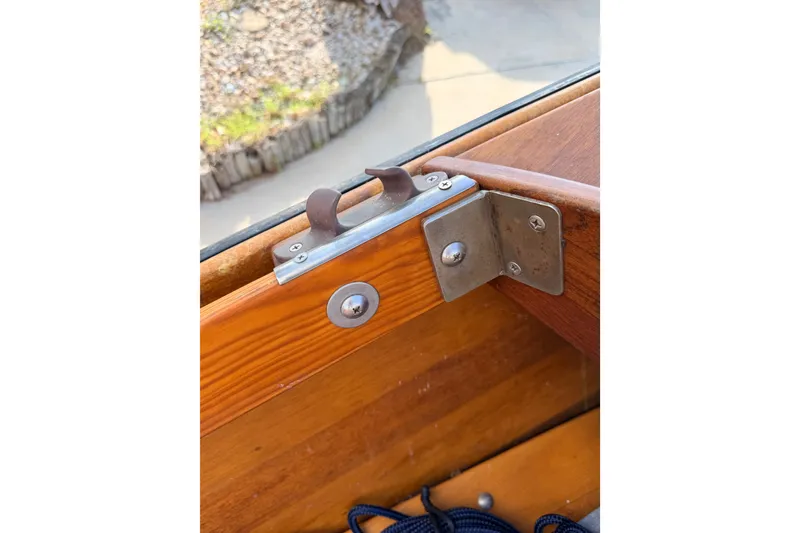 Slide: The Image of Close-up of a 2015 Homemade Jetdrive Skiff's wooden and metal boat latch. - 13