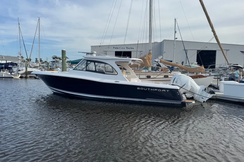 Slide: The Image of 2022 Southport 33 DC boat docked at Palm Cove Marina. - 30