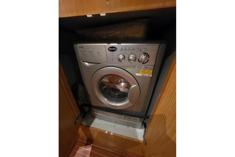 Slide: The Image of Built-in washing machine in 1993 McKinna 48 Pilothouse yacht interior. - 52