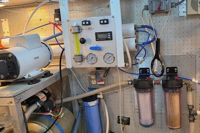 Slide: The Image of Engine room of a 1993 McKinna 48 Pilothouse with water filtration system. - 75