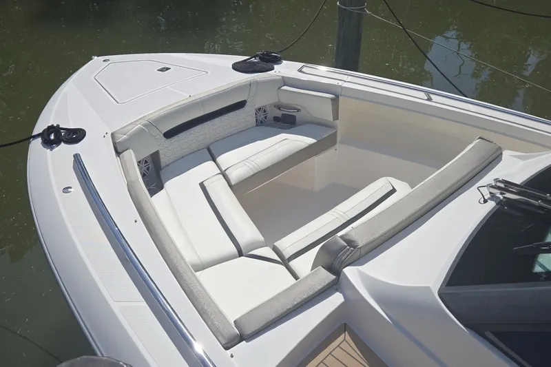 Slide: The Image of 2022 Tiara Yachts 34 LS boat with spacious seating area and sleek design. - 14