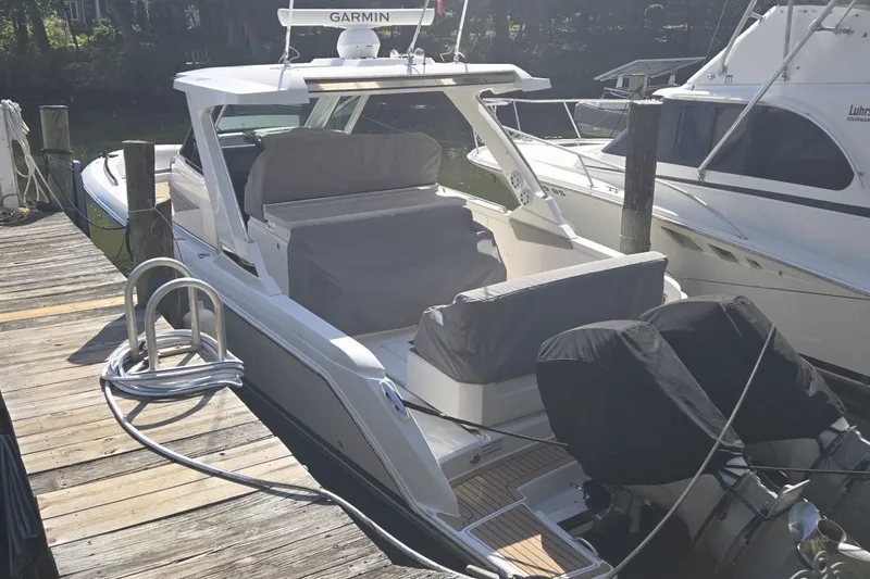 Slide: The Image of 2022 Tiara Yachts 34 LS docked, featuring sleek design and modern amenities. - 20