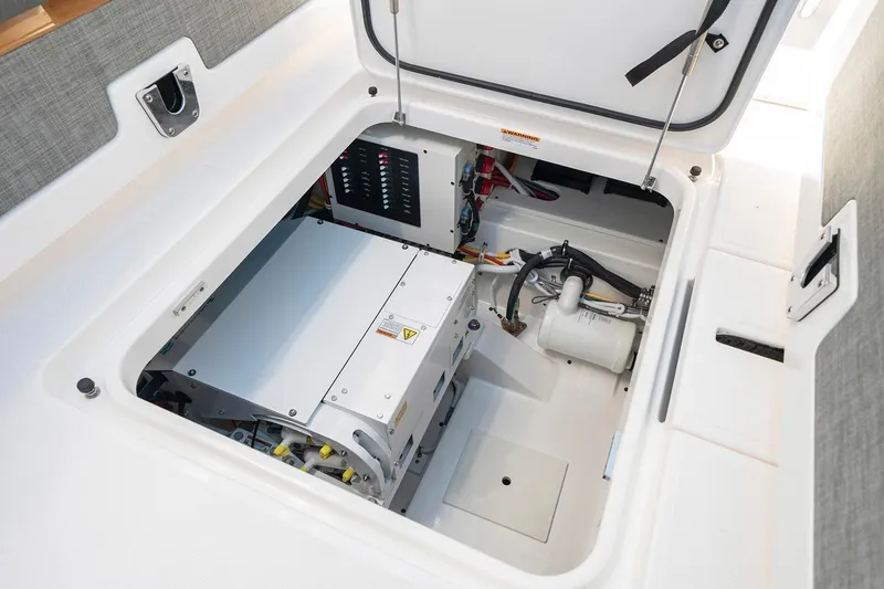 Slide: The Image of Manufacturer Provided Image: 2022 Tiara Yachts 34 LS engine compartment with electrical components and wiring. - 26