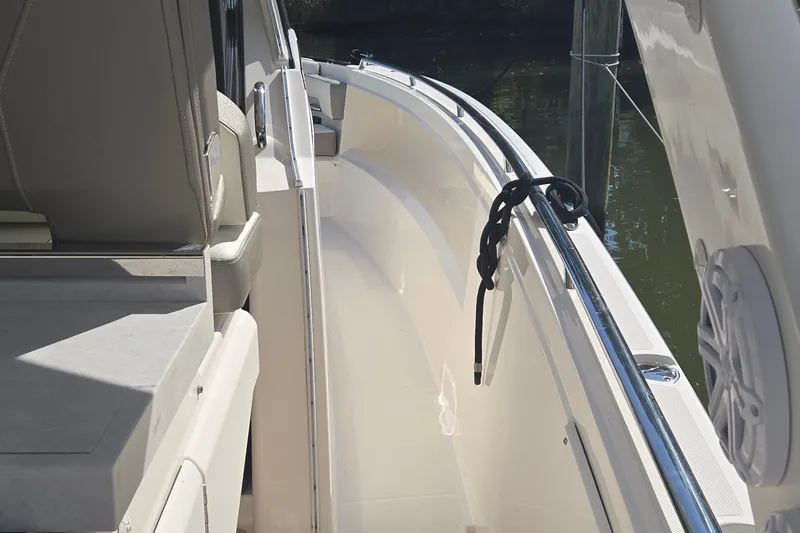 Slide: The Image of 2022 Tiara Yachts 34 LS boat deck with seating and railing detail. - 13