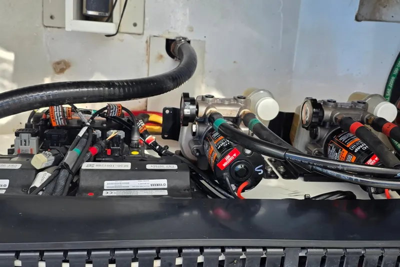 Slide: The Image of Electrical and mechanical components inside a 2019 Pursuit S 328 Sport boat. - 35