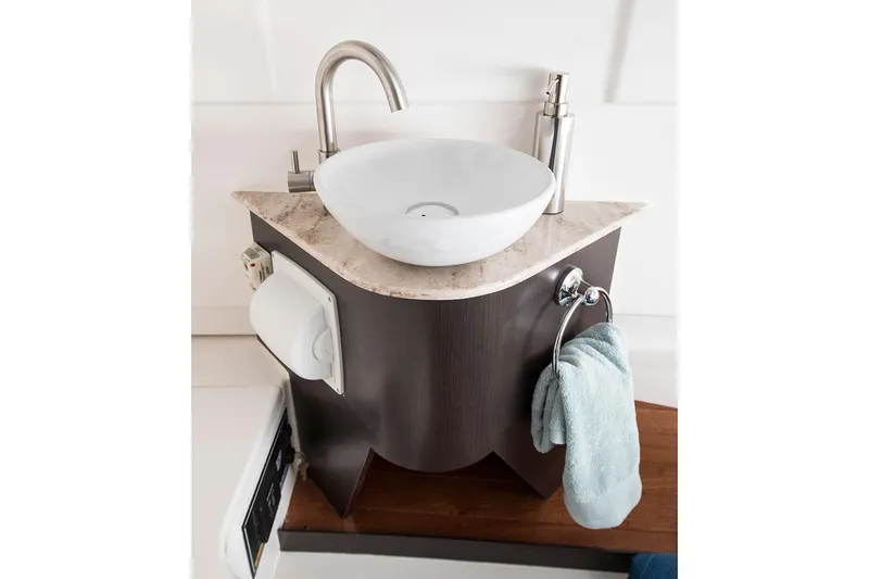 Slide: The Image of Manufacturer Provided Image: Compact bathroom sink in 2019 Pursuit S 328 Sport boat. - 39