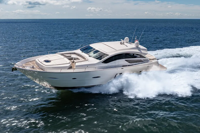 Slide: The Image of Luxurious 2010 Pershing 80 yacht cruising on open sea under clear skies. - 5