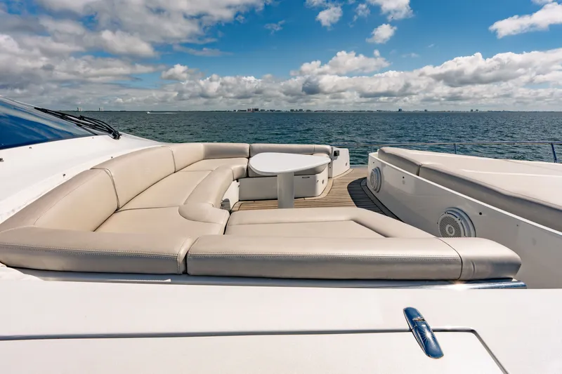 Slide: The Image of Luxurious 2010 Pershing 80 yacht deck with elegant seating and ocean view. - 31