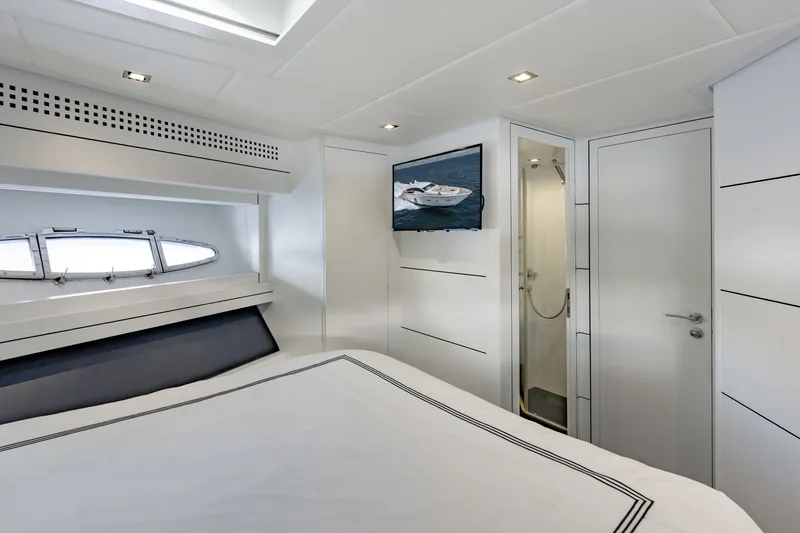 Slide: The Image of Luxurious interior of 2010 Pershing 80 yacht cabin with modern design and elegant furnishings. - 64