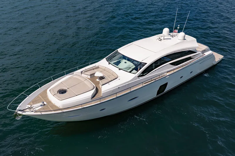 Slide: The Image of Luxurious 2010 Pershing 80 yacht cruising on open water, showcasing sleek design and elegance. - 14
