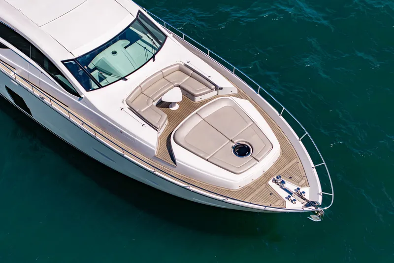 Slide: The Image of Aerial view of 2010 Pershing 80 yacht's sleek deck on blue ocean water. - 19