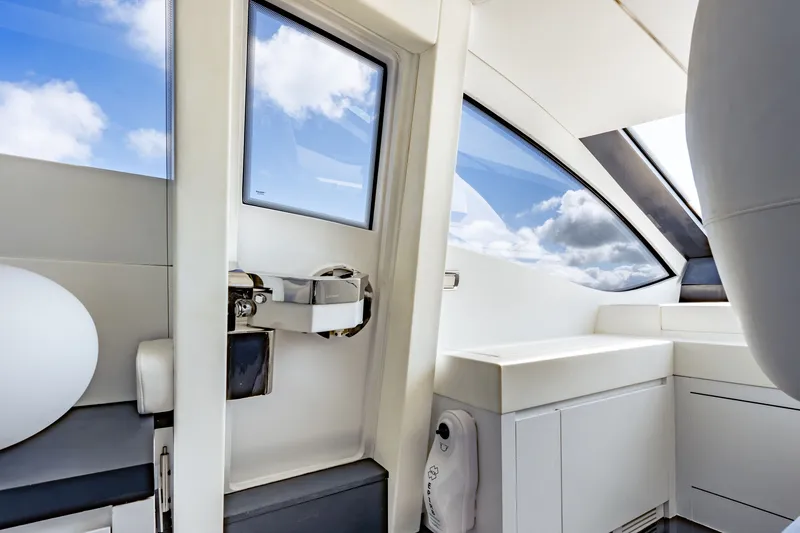 Slide: The Image of Interior of 2010 Pershing 80 yacht with sleek design and large windows. - 47