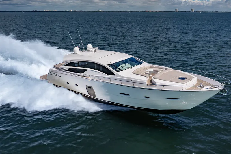 Slide: The Image of Luxurious 2010 Pershing 80 yacht cruising swiftly on open water. - 1
