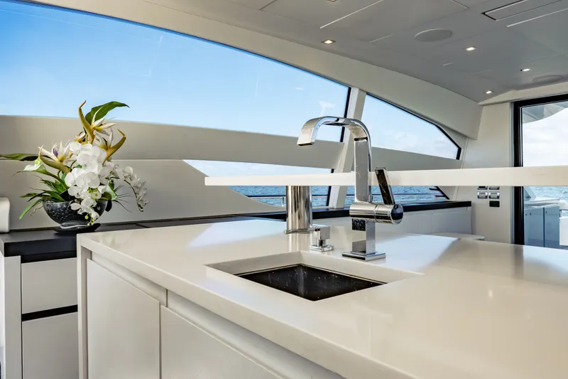 Slide: The Image of Luxurious interior of 2010 Pershing 80 yacht with modern kitchen and ocean view. - 39