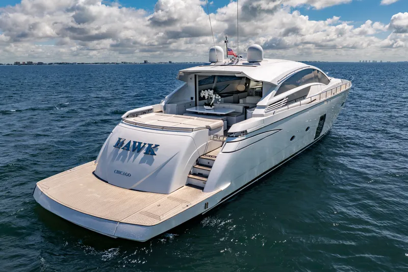 Slide: The Image of Luxurious 2010 Pershing 80 yacht cruising on open sea under cloudy sky. - 18
