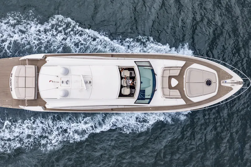 Slide: The Image of Aerial view of 2010 Pershing 80 yacht cruising on open water. - 9