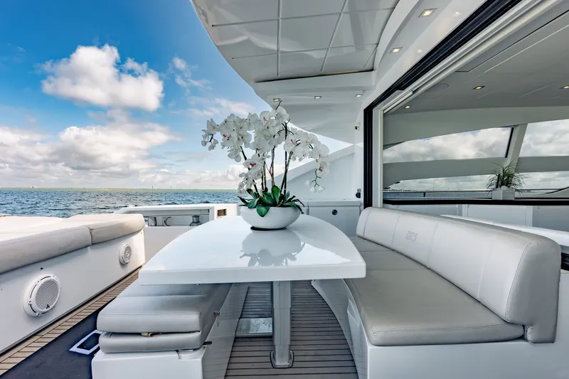 Slide: The Image of Luxurious Pershing 80 yacht deck with elegant seating and ocean view, 2010 model. - 26