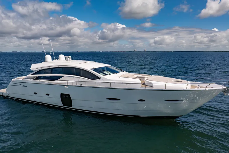 Slide: The Image of Luxury 2010 Pershing 80 yacht cruising on open sea under blue sky. - 11