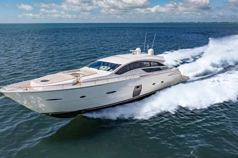 Slide: The Image of Luxurious 2010 Pershing 80 yacht cruising swiftly on open water under a clear sky. - 3