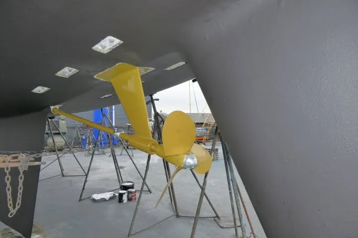Slide: The Image of Propeller and rudder of 1986 Tayana 52 Center Cockpit sailboat in dry dock. - 75