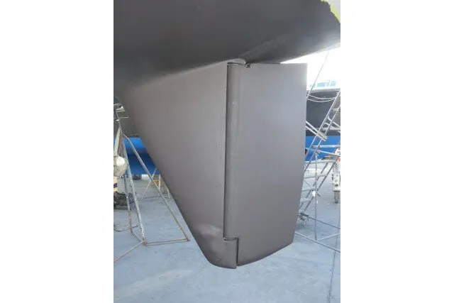 Slide: The Image of Rudder of 1986 Tayana 52 Center Cockpit sailboat on dry dock. - 76