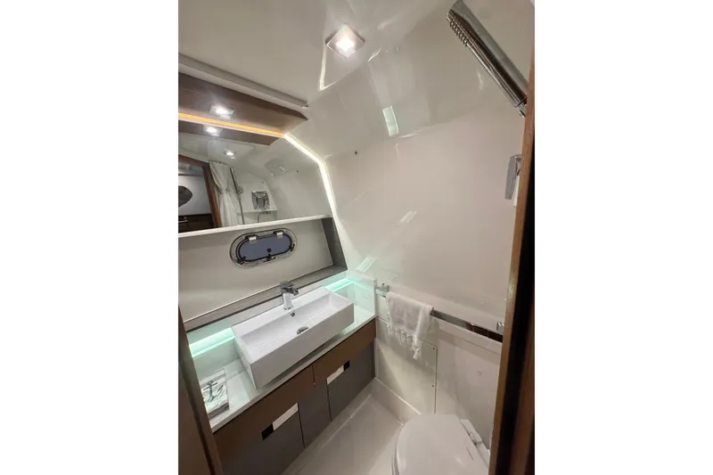 Slide: The Image of Luxurious bathroom in 2021 Tiara Sport 38 LS yacht with modern fixtures and sleek design. - 22