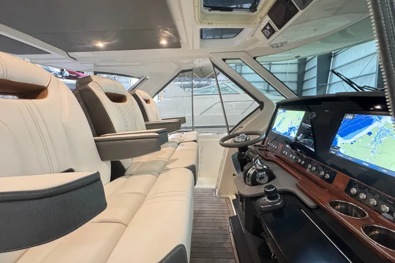 Slide: The Image of Luxurious interior of 2021 Tiara Sport 38 LS yacht with advanced navigation system. - 10