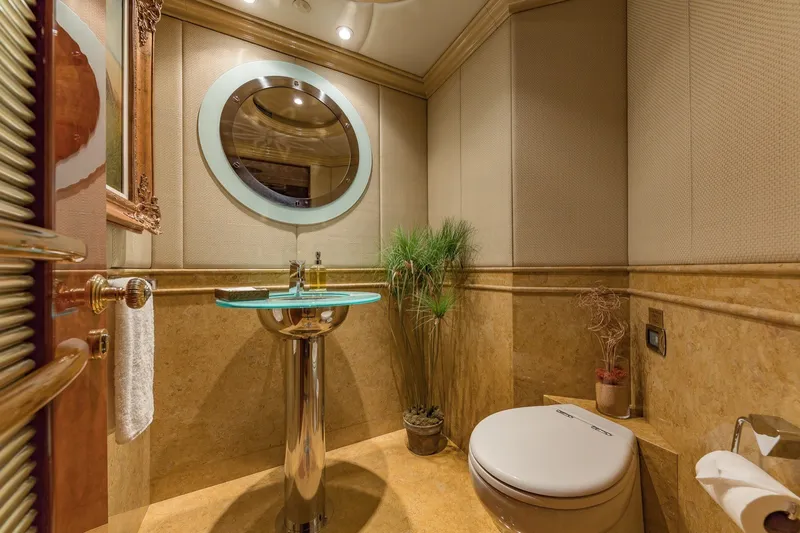 Slide: The Image of Luxurious yacht bathroom with modern fixtures, glass sink, and elegant decor on a 2002 Christensen Trideck. - 14
