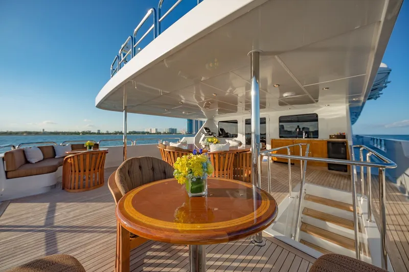 Slide: The Image of Luxurious 2002 Christensen Trideck yacht deck with elegant seating and ocean view. - 53