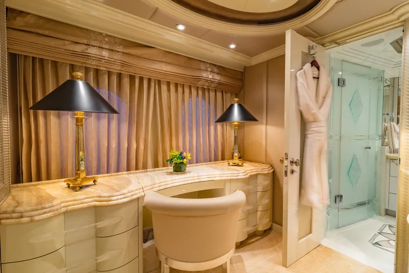 Slide: The Image of Luxurious yacht interior with elegant desk, lamps, and bathroom; Christensen Trideck 2002 model. - 19