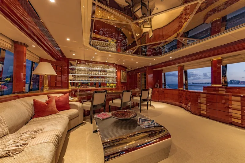 Slide: The Image of Luxurious interior of a 2002 Christensen Trideck yacht with elegant furnishings and panoramic windows. - 39