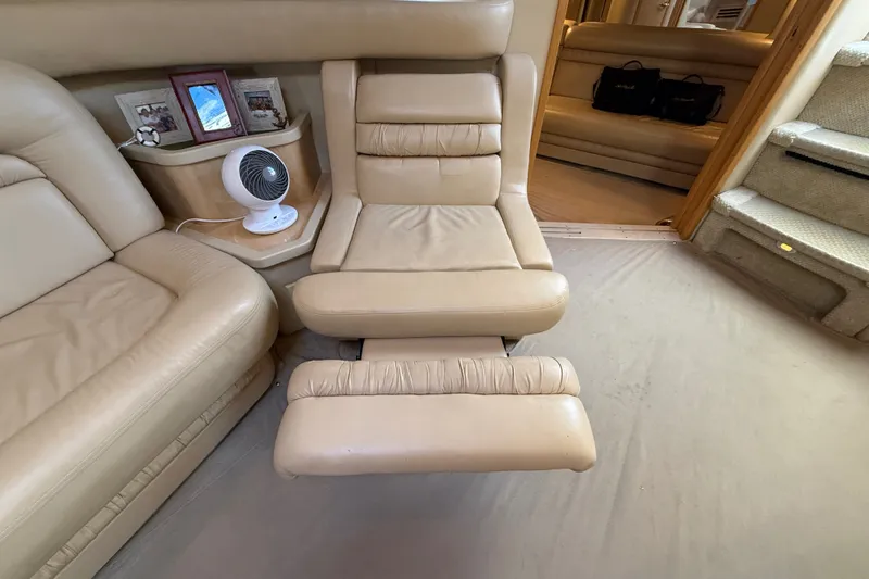 Slide: The Image of Luxurious interior of 2002 Sea Ray Sundancer 460 yacht with beige leather seating. - 47
