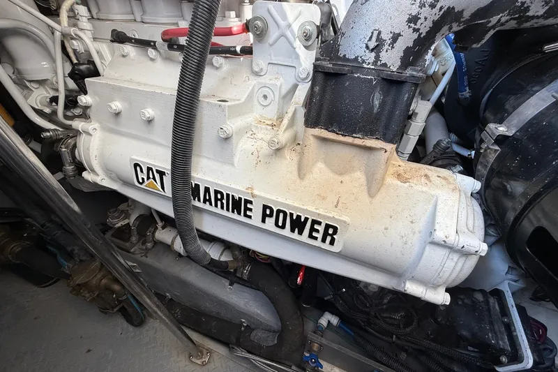 Slide: The Image of Engine compartment of a 2002 Sea Ray Sundancer 460 with CAT Marine Power. - 79