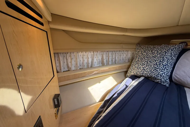 Slide: The Image of Cozy cabin interior of 2002 Sea Ray Sundancer 460 yacht with nautical decor. - 55
