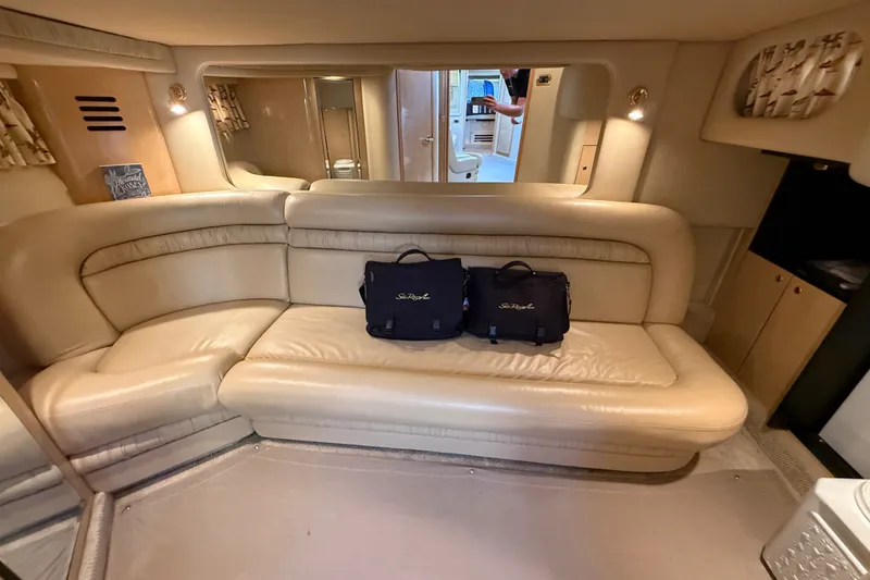 Slide: The Image of Luxurious interior of 2002 Sea Ray Sundancer 460 yacht with leather seating and stylish decor. - 65