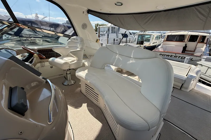 Slide: The Image of Luxurious interior of a 2002 Sea Ray Sundancer 460 yacht with plush seating. - 27
