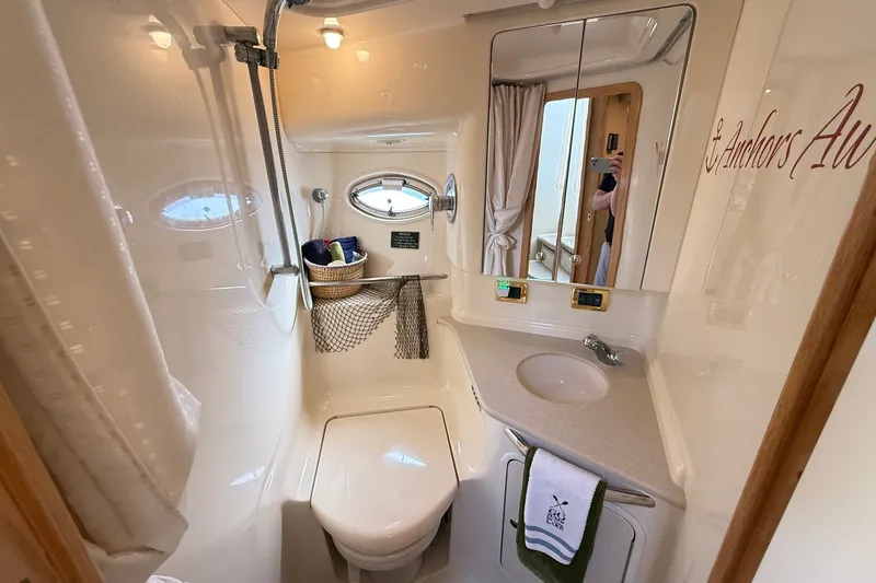 Slide: The Image of Bathroom interior of 2002 Sea Ray Sundancer 460 yacht, featuring shower and sink. - 71