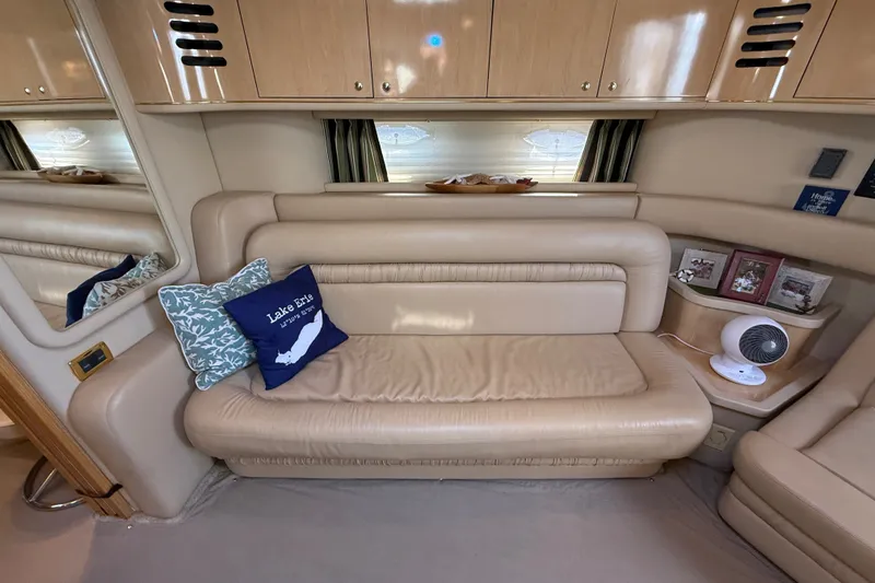 Slide: The Image of Luxurious interior of 2002 Sea Ray Sundancer 460 yacht with beige leather seating. - 48